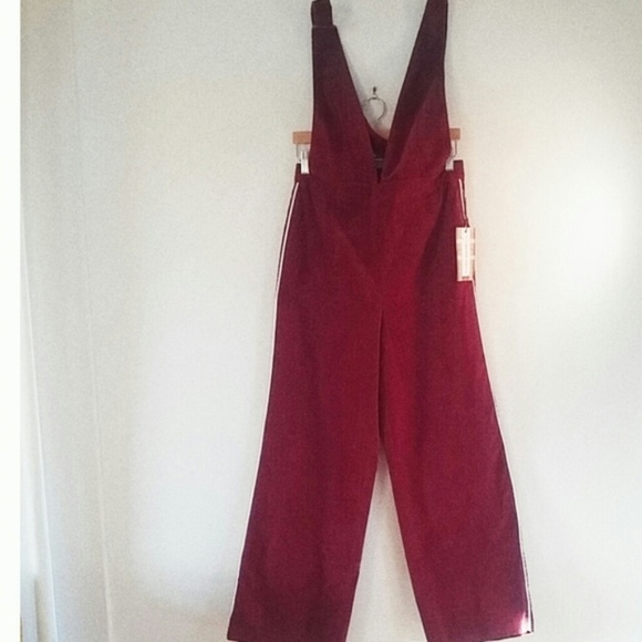 plunging pinafore jumpsuit